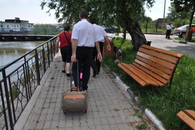 Ship's doctor takes my luggage for my Uniworld river cruise in Romania